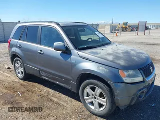 2006 Suzuki Grand Vitara Luxury z VIN JS3TE947164104381, wystawiony jako IAAI lot #41665094 z przebiegiem 145 874 mil mil oraz . Historia ofert i sprzedaży dostępna na DreamBid. Obrazek 1.