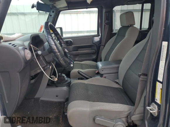 2007 Jeep Wrangler Unlimited X with VIN 1J4GA39117L119395, listed as a Copart auction lot 52588055 with 160,335 mi miles and Salvage title. Bid and sale history available at DreamBid. Image 7.