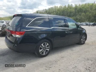2016 Honda Odyssey Touring Elite with VIN 5FNRL5H97GB038917, listed as a Copart auction lot 54479375 with 165,432 mi miles and Salvage Title. Bid and sale history available at DreamBid. Image 3.
