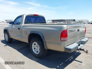 2002 Dodge Dakota with VIN 1B7FL16X72S642881, listed as a IAAI auction lot 42153560 with 220,917 mi miles and . Bid and sale history available at carsss.com. Image 3.