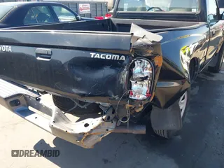 2003 Toyota Tacoma with VIN 5TENL42N33Z180883, listed as a IAAI auction lot 41676416 with 132,996 mi miles and . Bid and sale history available at DreamBid. Image 6.