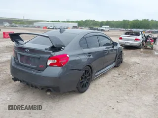 2020 Subaru WRX STI z VIN JF1VA2E65L9800214, wystawiony jako IAAI lot #42356355 z przebiegiem 80 377 mil mil oraz . Historia ofert i sprzedaży dostępna na DreamBid. Obrazek 4.