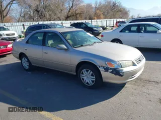 2001 Toyota Camry CE z VIN 4T1BG22K71U825358, wystawiony jako IAAI lot #41010787 z przebiegiem 192 651 mil mil oraz . Historia ofert i sprzedaży dostępna na DreamBid. Obrazek 1.