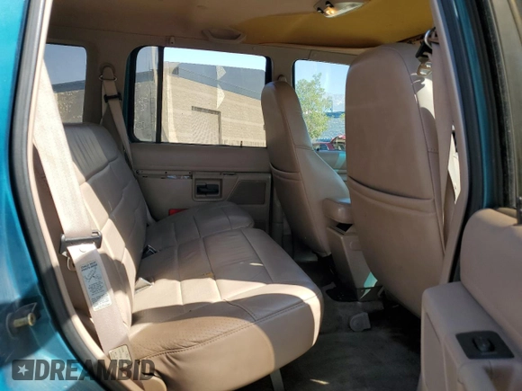 1994 Ford Explorer Eddie Bauer with VIN 1FMDU32X9RUB82820, listed as a Copart auction lot 64381565 with 88,664 mi miles and Salvage title. Bid and sale history available at DreamBid. Image 11.