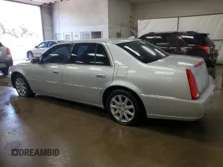 2009 Cadillac DTS 1SC z VIN 1G6KD57YX9U133637, wystawiony jako Copart lot #69585434 z przebiegiem 70 410 mil mil oraz Czysty tytuł • Clean title. Historia ofert i sprzedaży dostępna na DreamBid. Obrazek 2.