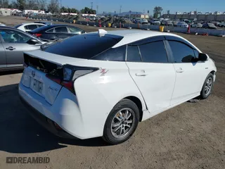 2021 Toyota Prius L Eco with VIN JTDKAMFU7M3148089, listed as a IAAI auction lot 41614915 with 119,725 mi miles. Bid and sale history available at carsss.com. Image 4.