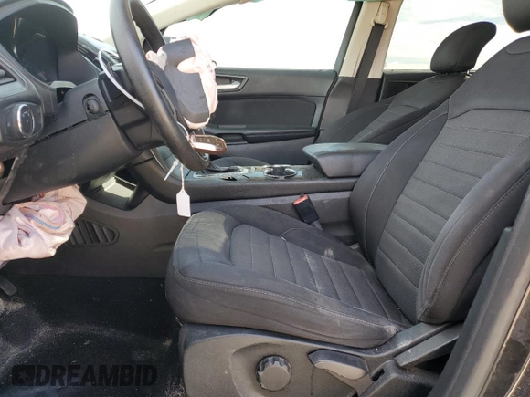 2015 Ford Edge SE with VIN 2FMTK3G95FBC42587, listed as a Copart auction lot 61586835 with 95,353 mi miles and Salvage title. Bid and sale history available at DreamBid. Image 7.