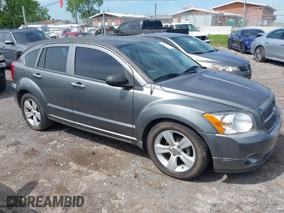 2011 Dodge Caliber Mainstreet with VIN 1B3CB3HA1BD247594, listed as a IAAI auction lot 42082305 with 122,438 mi miles. Bid and sale history available at carsss.com. Image 1.