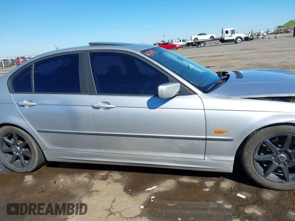 1999 BMW 3 Series 323i with VIN WBAAM3339XCD56164, listed as a IAAI auction lot 41867053 with 233,154 mi miles. Bid and sale history available at carsss.com. Image 14.