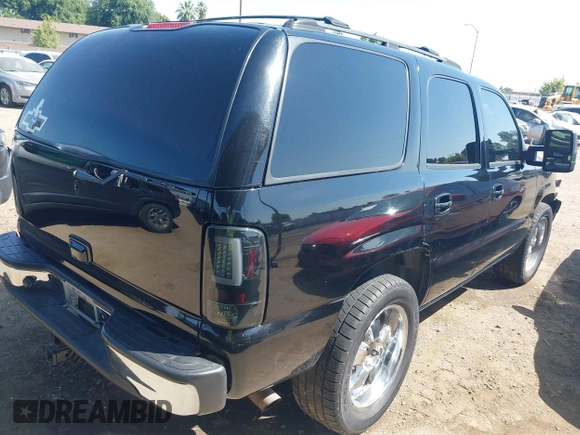 2003 Chevrolet Tahoe LS z VIN 1GNEC13T53J331221, wystawiony jako IAAI lot #42422243 z przebiegiem Nie podano mil oraz . Historia ofert i sprzedaży dostępna na DreamBid. Obrazek 4.