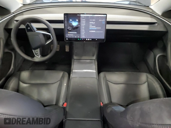 2024 Tesla Model 3 Long Range with VIN 5YJ3E1EBXRF818977, listed as a Copart auction lot 47303885 with 14,189 mi miles and Salvage Title. Bid and sale history available at DreamBid. Image 8.