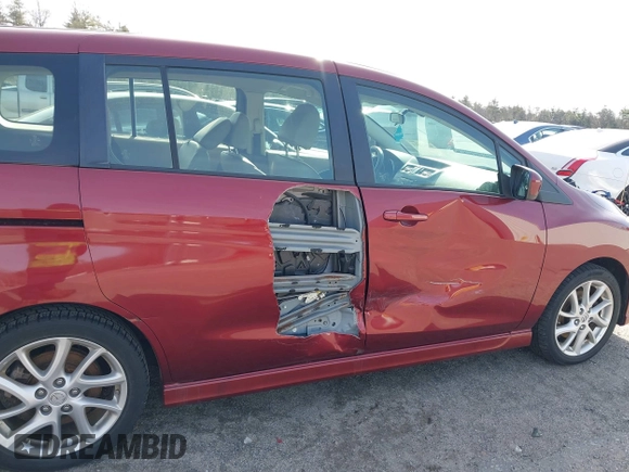 2012 Mazda 5 Grand Touring with VIN JM1CW2DL3C0144402, listed as a IAAI auction lot 41923524 with 150,584 mi miles and . Bid and sale history available at DreamBid. Image 6.