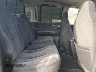 2004 Dodge Dakota SLT with VIN 1D7HG48NX4S677465, listed as a Copart auction lot 51044735 with 196,854 mi miles and Clean title. Bid and sale history available at DreamBid. Image 10.