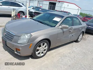 2006 Cadillac CTS z VIN 1G6DP577X60108313, wystawiony jako IAAI lot #42223144 z przebiegiem 98 329 mil mil oraz . Historia ofert i sprzedaży dostępna na DreamBid. Obrazek 2.