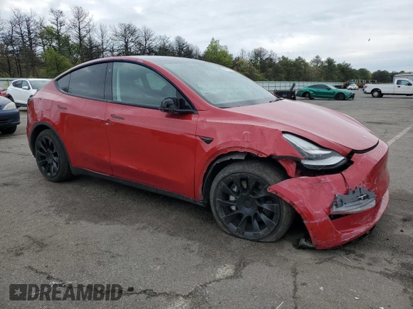 2022 Tesla Model Y Long Range z VIN 7SAYGDEE5NF388428, wystawiony jako Copart lot #56671385 z przebiegiem 17 250 mil mil oraz Szkody całkowita. Historia ofert i sprzedaży dostępna na DreamBid. Obrazek 4.