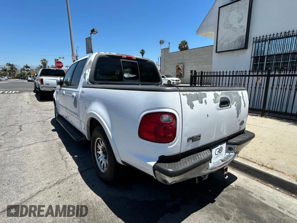 2001 Ford F-150 XLT с VIN 1FTRW07L11KF90642, выставлен на аукционе Copart как лот 64489205 с пробегом 242 959 миль миль и Списание • Salvage title. История ставок и продаж доступна на DreamBid. Изображение 3.