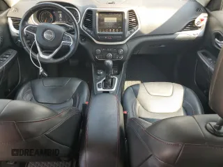 2016 Jeep Cherokee Trailhawk with VIN 1C4PJMBS4GW353088, listed as a Copart auction lot 62275145 with 129,758 mi miles and Clean title. Bid and sale history available at DreamBid. Image 8.