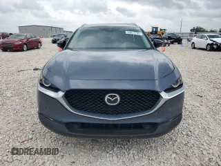 2023 Mazda CX-30 S Carbon Edition z VIN 3MVDMBCM2PM539130, wystawiony jako Copart lot #54817735 z przebiegiem 29 678 mil mil oraz Szkoda całkowita • Salvage title. Historia ofert i sprzedaży dostępna na DreamBid. Obrazek 5.
