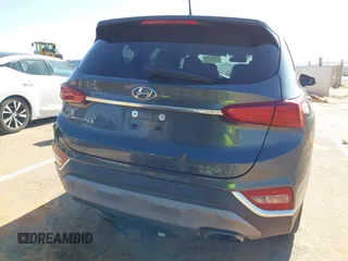 2019 Hyundai Santa Fe SE with VIN 5NMS23AD2KH134016, listed as a IAAI auction lot 41977240 with 61,448 mi miles and . Bid and sale history available at DreamBid. Image 16.