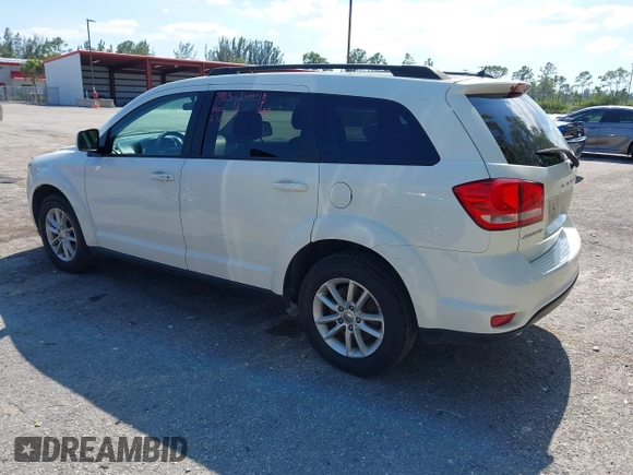 2015 Dodge Journey SXT with VIN 3C4PDCBG4FT727376, listed as a IAAI auction lot 42029881 with 151,042 mi miles. Bid and sale history available at carsss.com. Image 3.