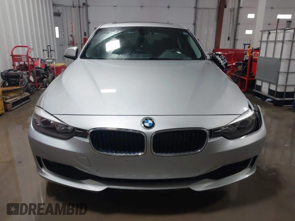 2014 BMW 3 Series 328d xDrive with VIN WBA3D5C55EF147308, listed as a IAAI auction lot 41499435 with 104,941 mi miles. Bid and sale history available at carsss.com. Image 13.
