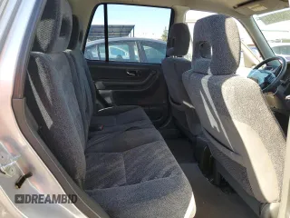 2001 Honda CR-V EX with VIN JHLRD18671C044316, listed as a Copart auction lot 77634294 with 280,083 mi miles and Salvage Title. Bid and sale history available at carsss.com. Image 11.