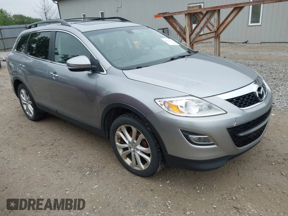 2012 Mazda CX-9 Grand Touring z VIN JM3TB3DA0C0337713, wystawiony jako IAAI lot #42368488 z przebiegiem 184 220 mil mil oraz . Historia ofert i sprzedaży dostępna na DreamBid. Obrazek 1.