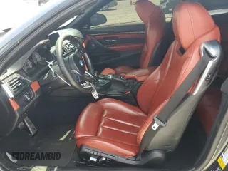 2018 BMW M4 with VIN WBS4Z9C50JED22222, listed as a Copart auction lot 57043595 with 71,899 mi miles and Salvage title. Bid and sale history available at DreamBid. Image 7.