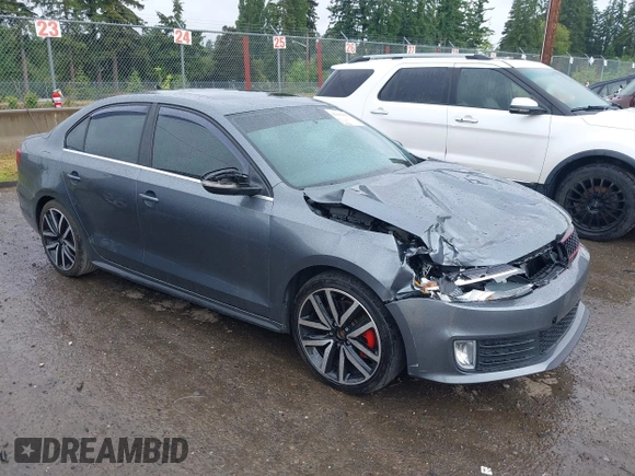2014 Volkswagen Jetta GLI z VIN 3VW4T7AJ2EM208598, wystawiony jako IAAI lot #42381855 z przebiegiem 82 761 mil mil oraz . Historia ofert i sprzedaży dostępna na DreamBid. Obrazek 1.