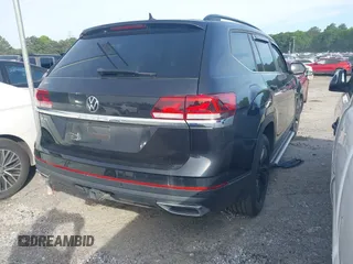 2023 Volkswagen Atlas SE z VIN 1V2JR2CA6PC504408, wystawiony jako IAAI lot #41475520 z przebiegiem 45 932 mil mil oraz . Historia ofert i sprzedaży dostępna na DreamBid. Obrazek 4.