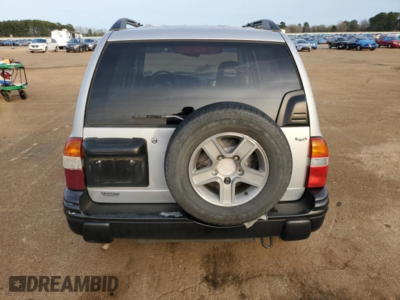 2004 Chevrolet Tracker LT z VIN 2CNBE634X46900683, wystawiony jako Copart lot #88601815 z przebiegiem 146 915 mil mil oraz Szkoda całkowita • Salvage title. Historia ofert i sprzedaży dostępna na DreamBid. Obrazek 6.