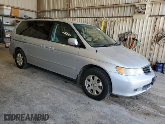 2002 Honda Odyssey EX z VIN 5FNRL18622B049511, wystawiony jako Copart lot #55265485 z przebiegiem 208 693 mil mil oraz Czysty tytuł • Clean title. Historia ofert i sprzedaży dostępna na DreamBid. Obrazek 4.