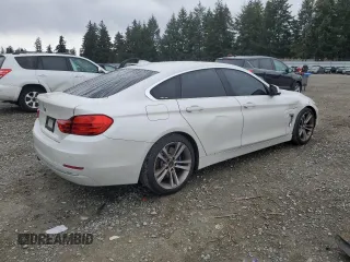 2015 BMW 4 Series 428i with VIN WBA4A5C52FGK15623, listed as a Copart auction lot 49856825 with 144,135 mi miles and Salvage Title. Bid and sale history available at DreamBid. Image 3.