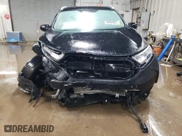2017 Honda CR-V Touring with VIN 2HKRW2H91HH608340, listed as a Copart auction lot 43997625 with 58,446 mi miles and Salvage Title. Bid and sale history available at DreamBid. Image 5.