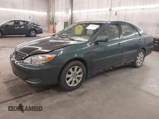 2004 Toyota Camry LE with VIN 4T1BE32K04U361670, listed as a IAAI auction lot 42139994 with 205,899 mi miles. Bid and sale history available at carsss.com. Image 2.