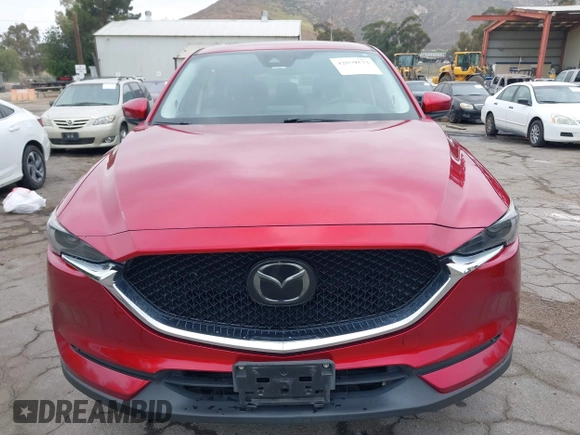 2018 Mazda CX-5 Grand Touring with VIN JM3KFADMXJ0302656, listed as a IAAI auction lot 42099173 with 125,378 mi miles and . Bid and sale history available at DreamBid. Image 12.