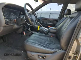 1998 Jeep Grand Cherokee Limited with VIN 1J4GZ88Z9WC148445, listed as a Copart auction lot 65961744 with 180,067 mi miles and Clean Title. Bid and sale history available at carsss.com. Image 7.