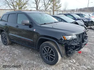 2019 Jeep Grand Cherokee Trailhawk with VIN 1C4RJFLTXKC696820, listed as a IAAI auction lot 41443851 with 50,848 mi miles. Bid and sale history available at carsss.com. Image 1.