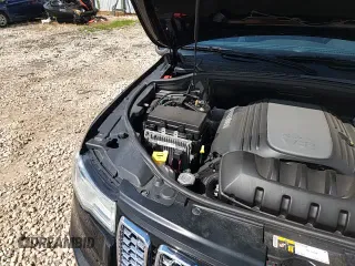 2019 Jeep Grand Cherokee Overland z VIN 1C4RJFCT3KC655672, wystawiony jako Copart lot #70693685 z przebiegiem 63 219 mil mil oraz Szkoda całkowita • Salvage title. Historia ofert i sprzedaży dostępna na DreamBid. Obrazek 15.