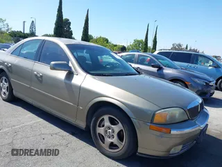 2001 Lincoln LS z VIN 1LNHM86S31Y714332, wystawiony jako IAAI lot #42238079 z przebiegiem 74 152 mil mil oraz . Historia ofert i sprzedaży dostępna na DreamBid. Obrazek 1.