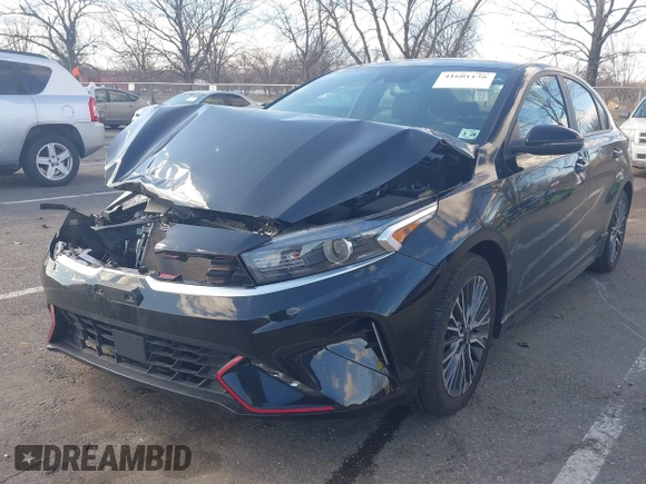 2023 Kia Forte GT-Line z VIN 3KPF54ADXPE580248, wystawiony jako IAAI lot #41601138 z przebiegiem 21 881 mil mil oraz . Historia ofert i sprzedaży dostępna na DreamBid. Obrazek 2.