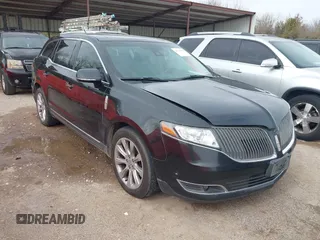 2015 Lincoln MKT EcoBoost with VIN 2LMHJ5AT1FBL01406, listed as a IAAI auction lot 41746898 with 206,605 mi miles and . Bid and sale history available at DreamBid. Image 1.