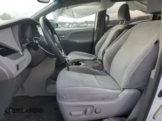 2017 Toyota Sienna LE with VIN 5TDJZ3DCXHS180970, listed as a Copart auction lot 88876535 with 180,318 mi miles and Salvage Title. Bid and sale history available at carsss.com. Image 7.