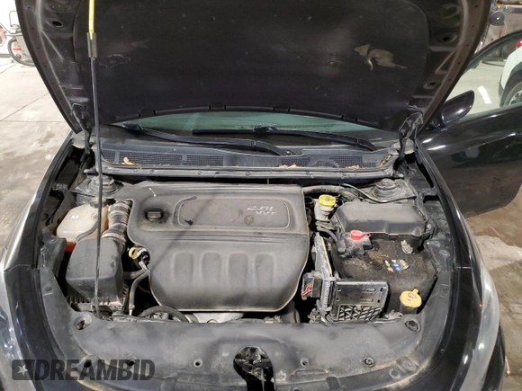 2013 Dodge Dart SXT z VIN 1C3CDFBA7DD289360, wystawiony jako Copart lot #58164025 z przebiegiem 113 736 mil mil oraz Szkoda całkowita • Salvage title. Historia ofert i sprzedaży dostępna na DreamBid. Obrazek 11.