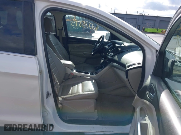 2013 Ford Escape SEL with VIN 1FMCU9H94DUB29989, listed as a IAAI auction lot 42075895 with 147,242 mi miles and . Bid and sale history available at DreamBid. Image 5.