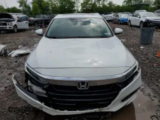2019 Honda Accord EX z VIN 1HGCV1F4XKA160108, wystawiony jako Copart lot #57134665 z przebiegiem 152 412 mil mil oraz Szkoda całkowita • Salvage title. Historia ofert i sprzedaży dostępna na DreamBid. Obrazek 5.