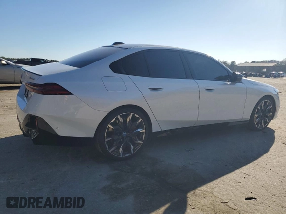 2024 BMW i5 M60 with VIN WBY43FK00RCP86174, listed as a Copart auction lot 45522685 with 7,392 mi miles and Salvage title. Bid and sale history available at DreamBid. Image 3.