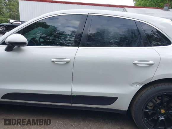 2015 Porsche Macan S z VIN WP1AB2A53FLB65406, wystawiony jako IAAI lot #42202535 z przebiegiem 135 492 mil mil oraz . Historia ofert i sprzedaży dostępna na DreamBid. Obrazek 14.