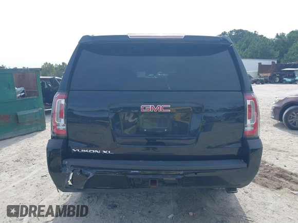 2019 GMC Yukon XL SLT with VIN 1GKS2GKCXKR359166, listed as a IAAI auction lot 40546837 with Not provided miles and . Bid and sale history available at DreamBid. Image 16.