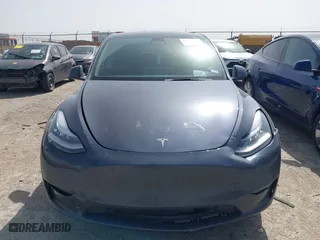 2023 Tesla Model Y Long Range with VIN 7SAYGDEE5PA035722, listed as a IAAI auction lot 41726067 with 34,357 mi miles. Bid and sale history available at carsss.com. Image 12.
